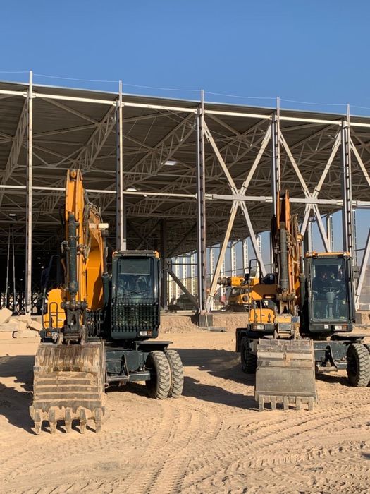 Колесный ЭКСКОВАТОР 210 и 140