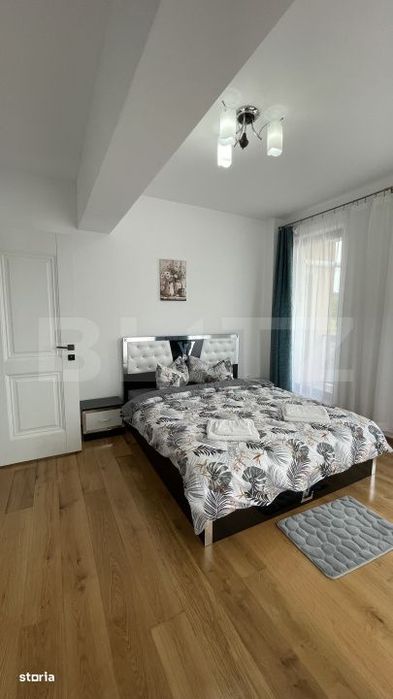 Apartament bloc nou, 72 mp, 2 dormitoare si living, parter, zona Nord