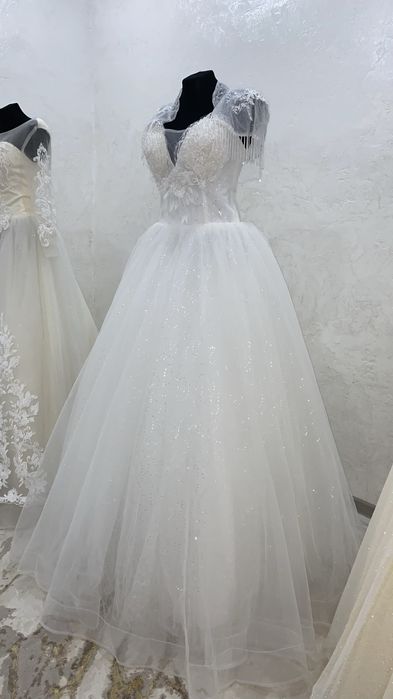 Свадебные платья новые