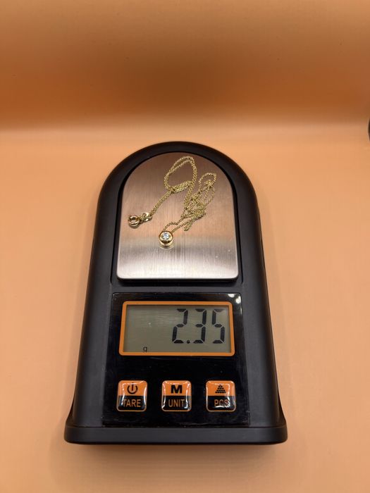 Продам золотую цепочку - подвеску.