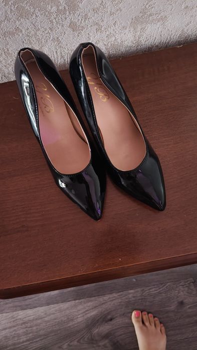 Новые туфли на каблуке