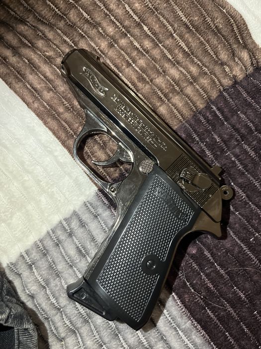 Зажигалка в виде пистолета