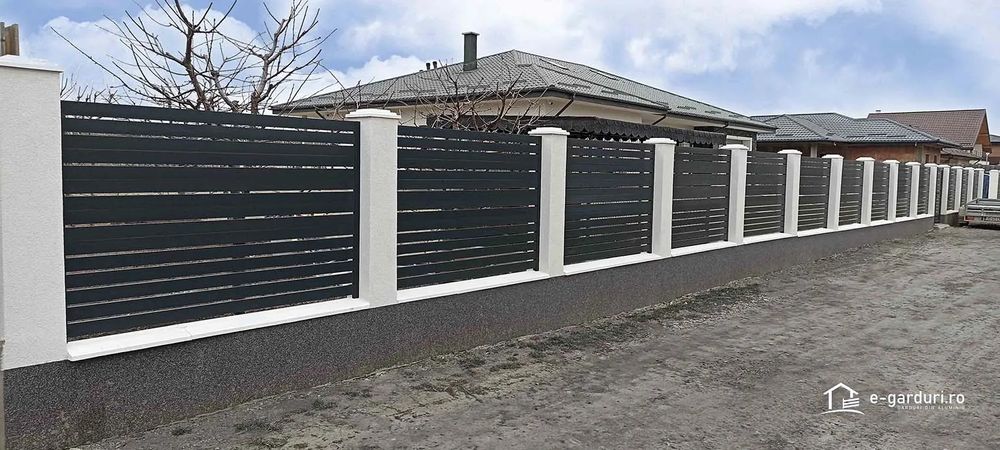 Executam garduri si porti