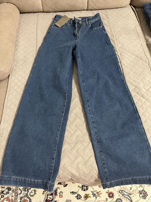 Продам женские джинсы