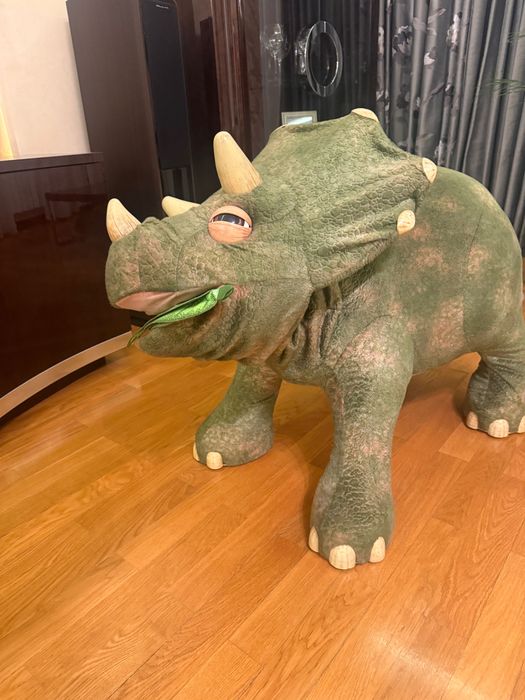 Динозавр музыкальный