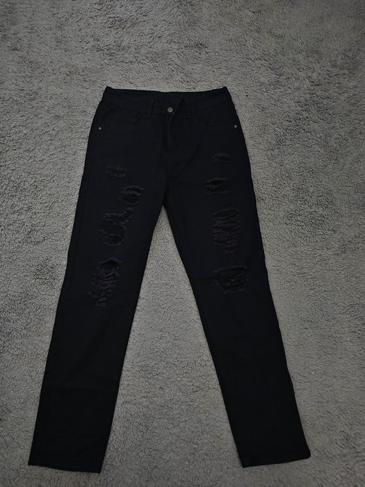Blugi flared jeans rupti