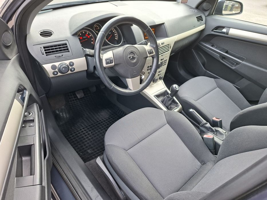 Opel astra h facelift 2009 1.6 benzina .164.000km.reali