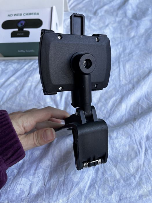 Bluetooth слушалка и стойла за кола