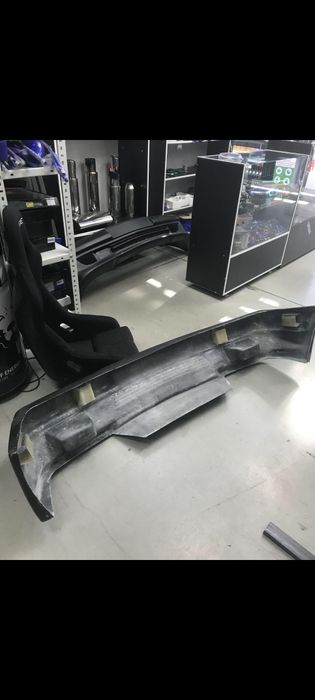 Бампер Мерседес W 124 AMG