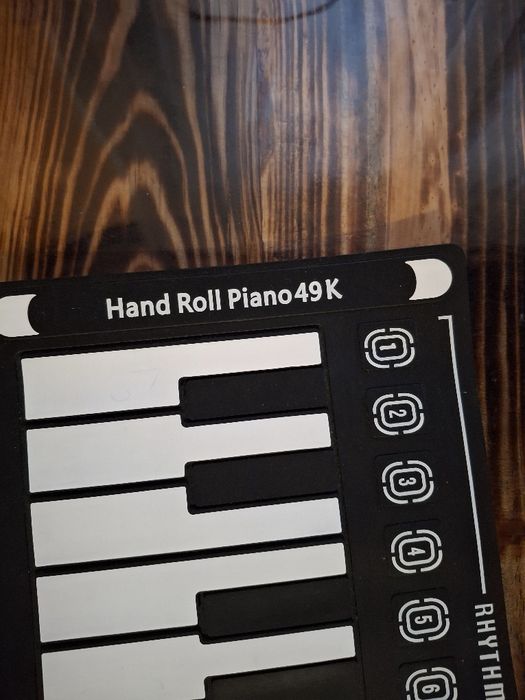 Hand roll piano.