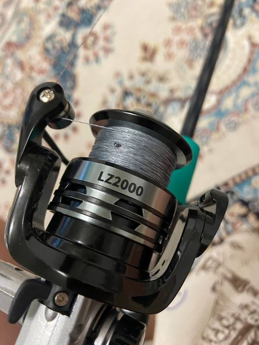 Спининг новый 10.000