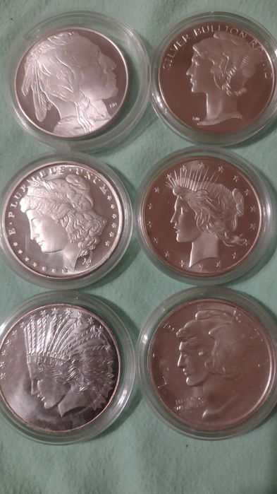 Lot 3  bucati (uncii )argint dolari U.S.A