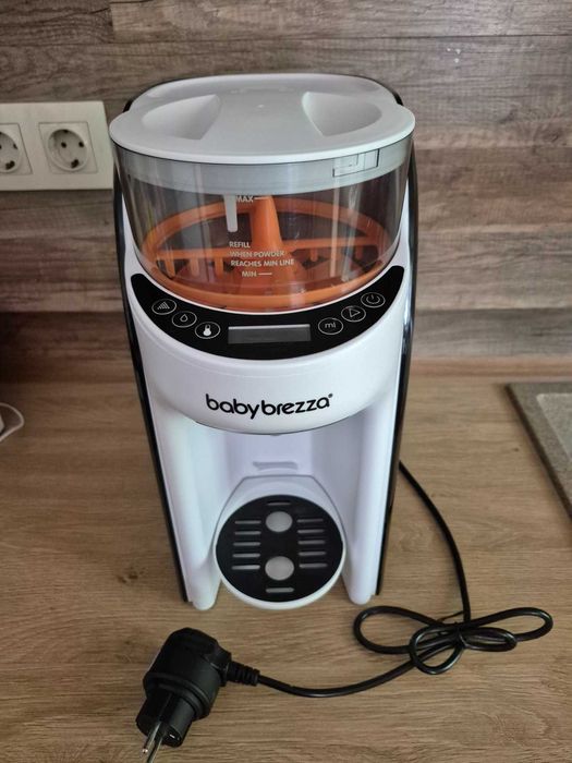Baby Brezza pro advance машина за мляко