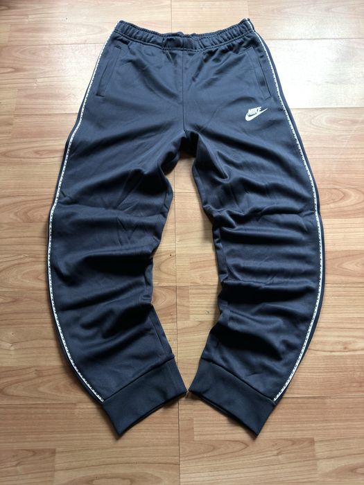 Pantaloni training pants joggers tapered leg Nike blue poliester