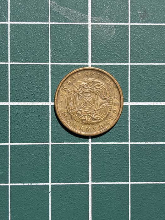 Монета номиналом 5тиын