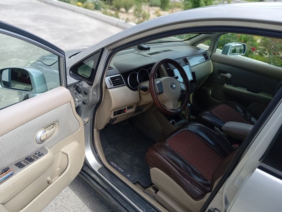 Nissan tida 1.6 2006 yil seriy maksimum 300$ li ishi bor narxi 5500$