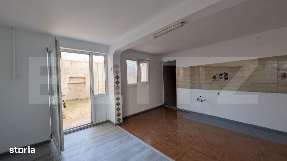 Casa cu 2 camere si mansarda ,plus bucatarie de vara .