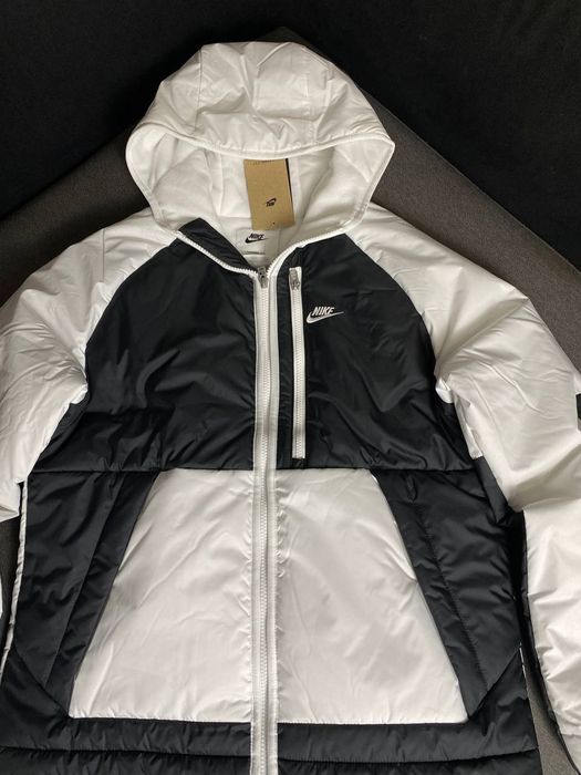 Продам оригинал пуховик от Nike