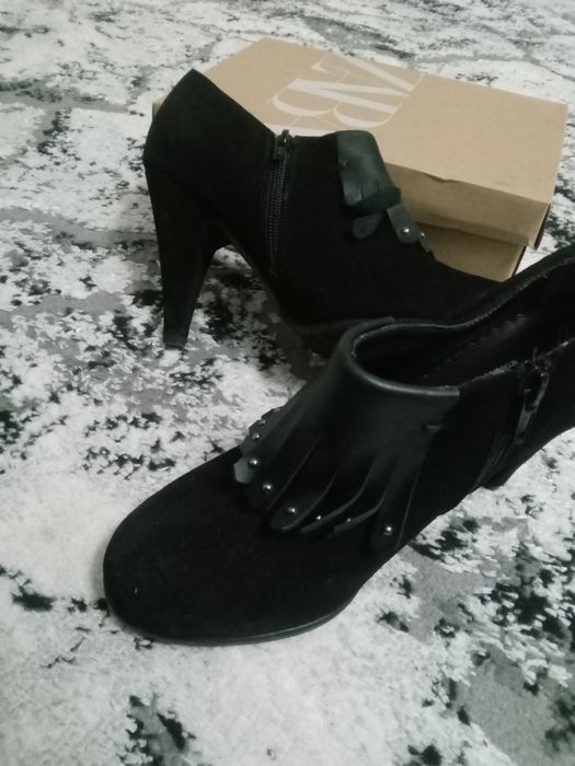 Туфли янги кийилмаган