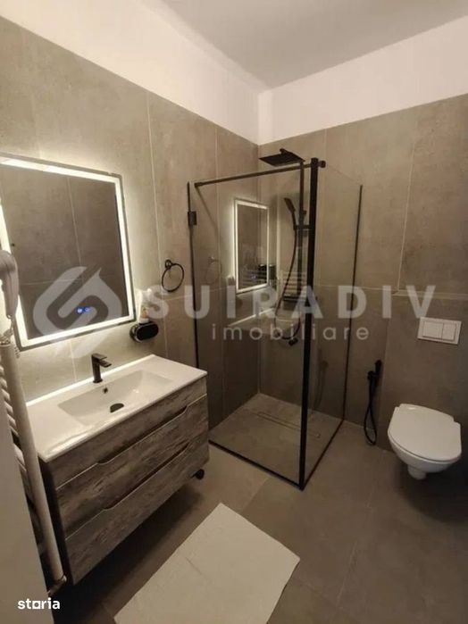 Apartament modern, curte proprie, parcare- zona Ira