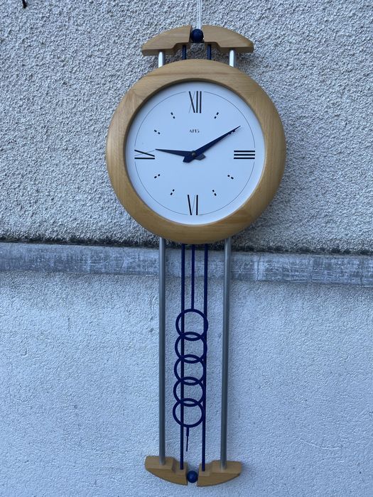 Mai multe ceasuri de perete quartz