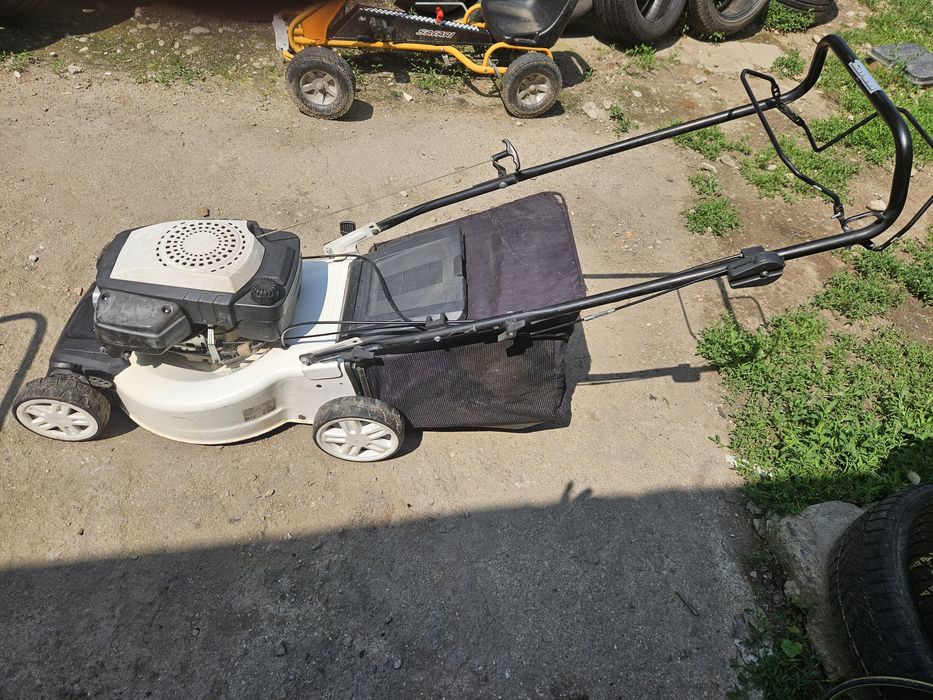 Masina de tuns iarba benzina si electrica