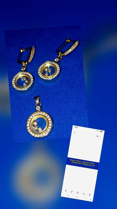 Продам серьги с кулоном