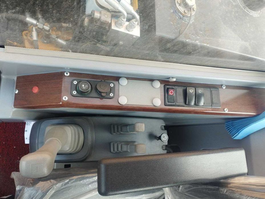 Экскаватор колёсный 0.3 куб