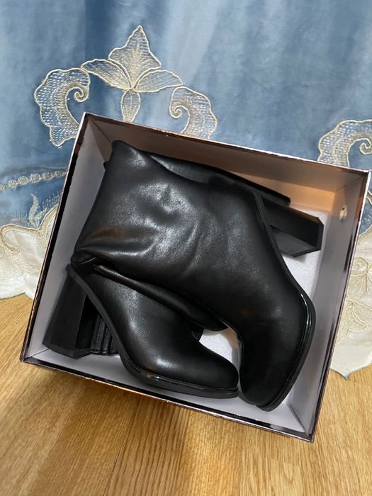 Кожаные сапоги .