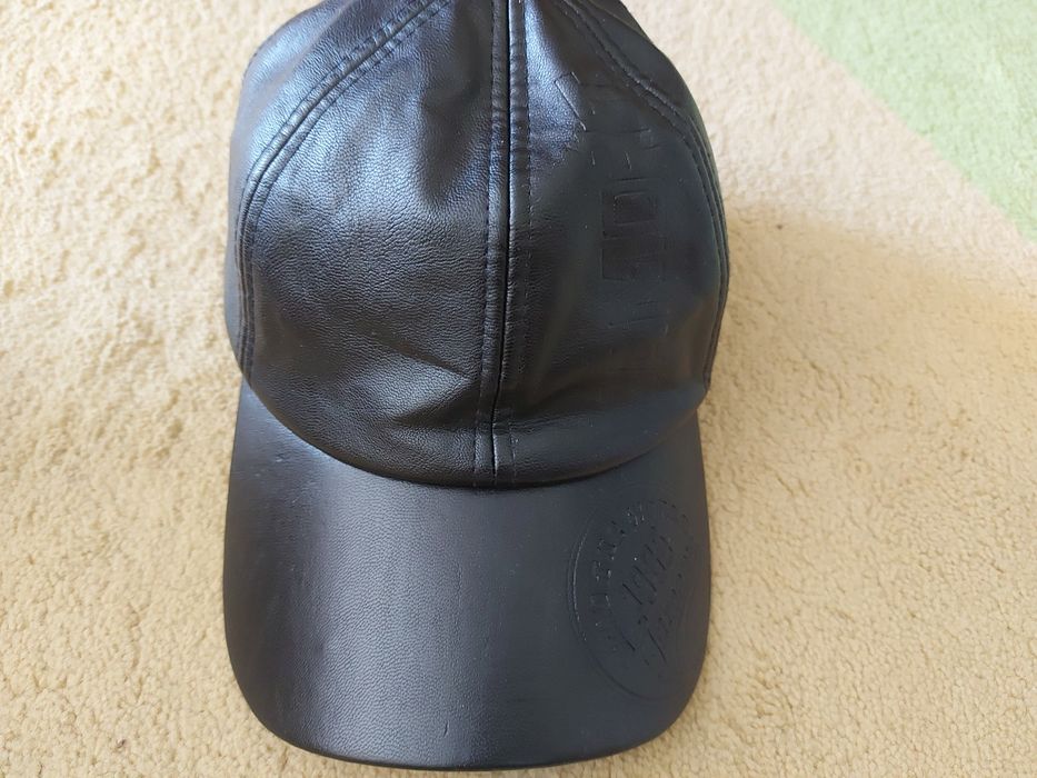 Продавам мъжка шуба от естествена кожа и подарък каскет