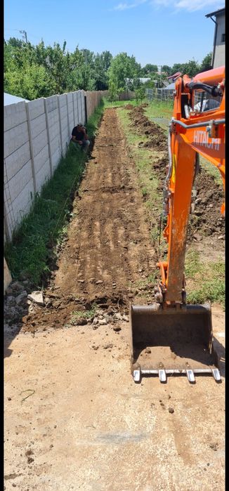 Miniexcavator Bobcat de inchiriat  pentru nivelare teren /demolari/defrisare/sapaturi/fundatii/canalizari/descarcare mecanizata paleti etc
