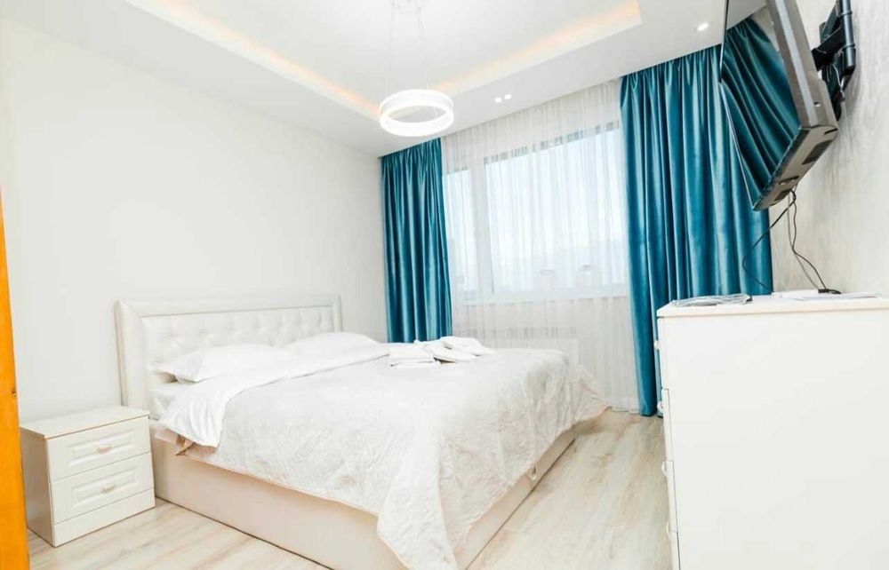 Люксовая квартира посуточно в ЖК Гаухартас на Абая в центре