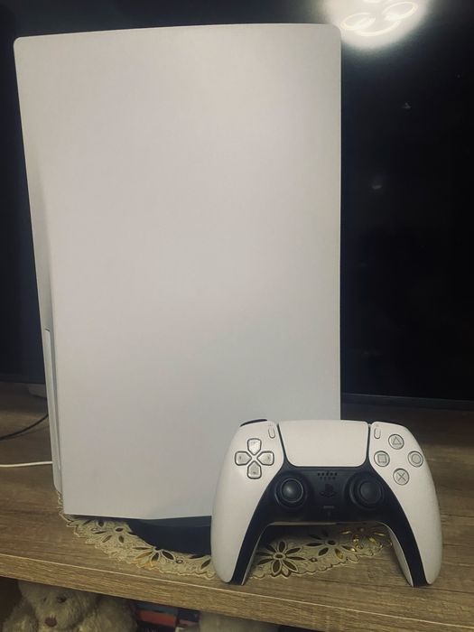 PlayStation 5 Disk Edition + casti PlayStation + 9 jocuri