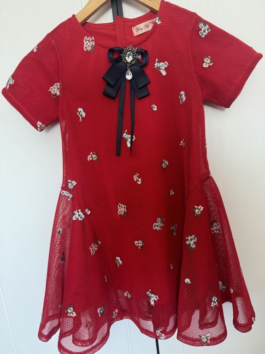 Продам детское платье от Deloras