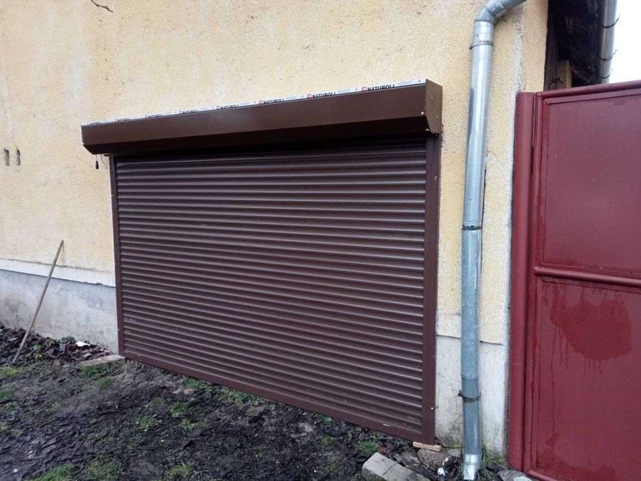 Usi garaj rulou=actionare electrica