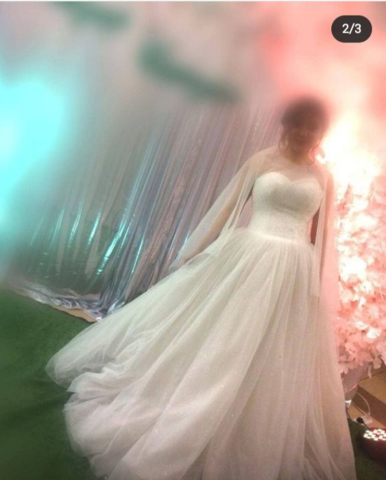 Продам свадебную платье