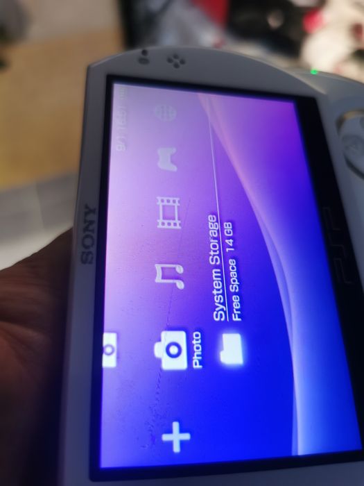 PSP-N1004 GO 2005 Г