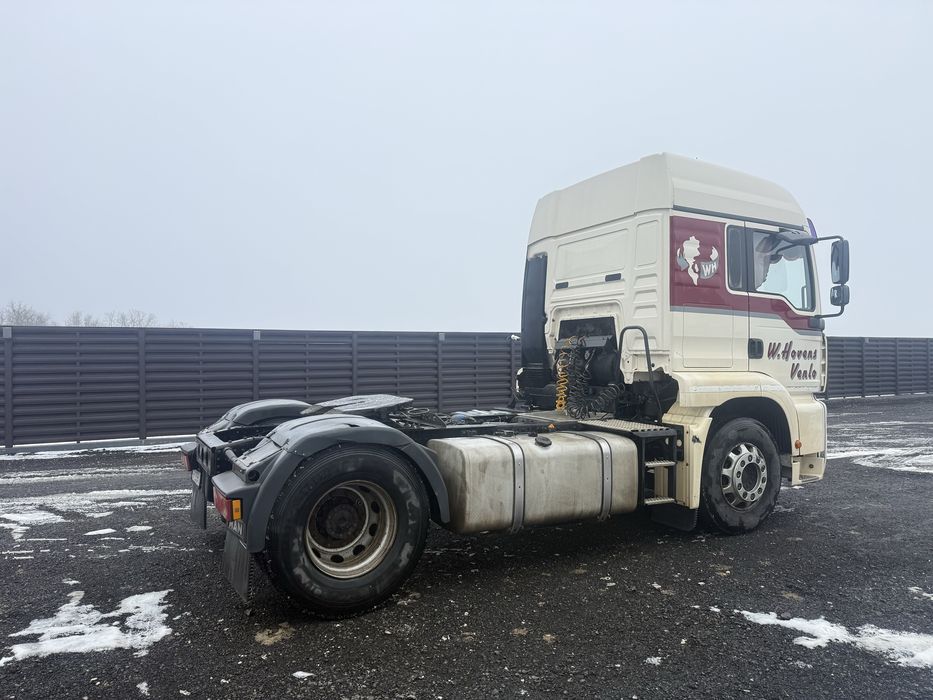 Cap tractor man tga