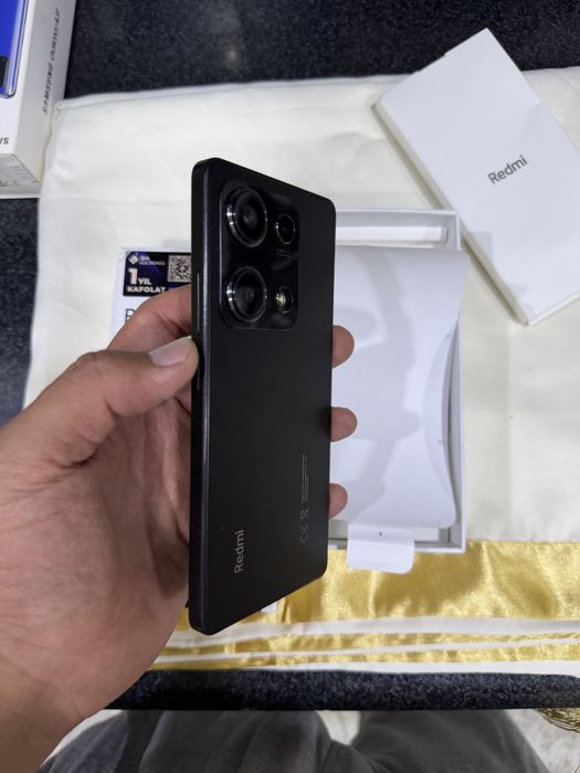 redmi not 14s pamit 8.256g holati ideal karopka dak bor