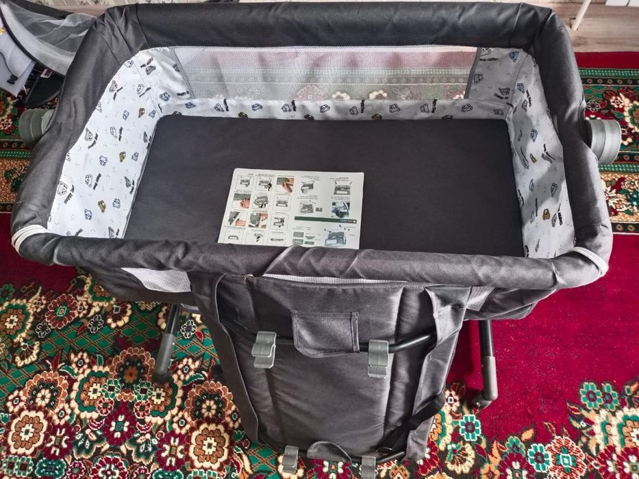 Продам новый манеж-кровать