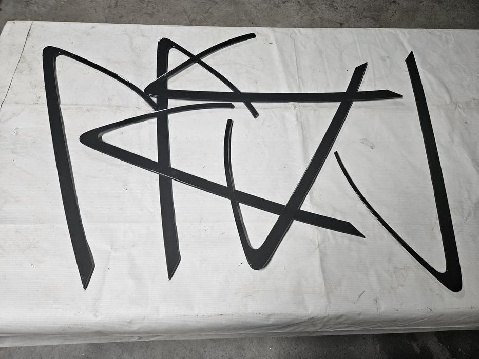 Бумеранг(молдинг боковой форточки)