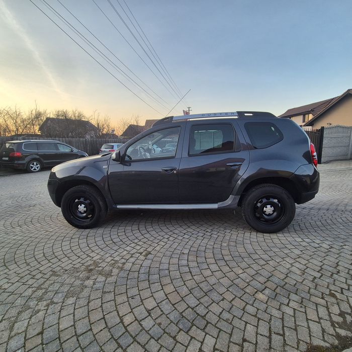 Dacia Duster , benzina ,euro 5 , clima functionala , piele , navi , Rate ,Germania ,2014