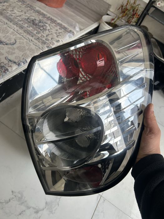 Задний стоп фонарь каптива