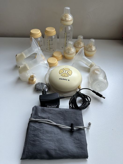 Електрическа помпа за кърма Medela Swing с бутилки и аксесоари