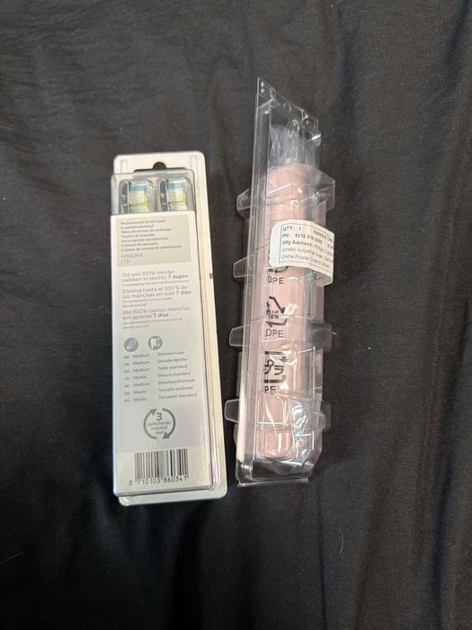 Pachet Philips Sonicare: Periuță electrică roz + Set 8 capete rezerve