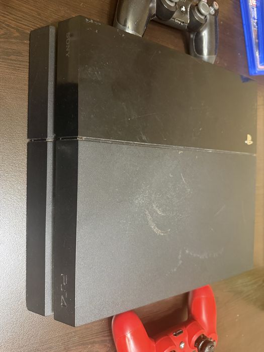 PS4 Fat + 2 джойстика + 10 игри