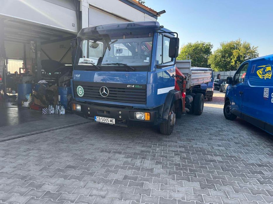 Камион с кран – транспорт и разтоварване на материали