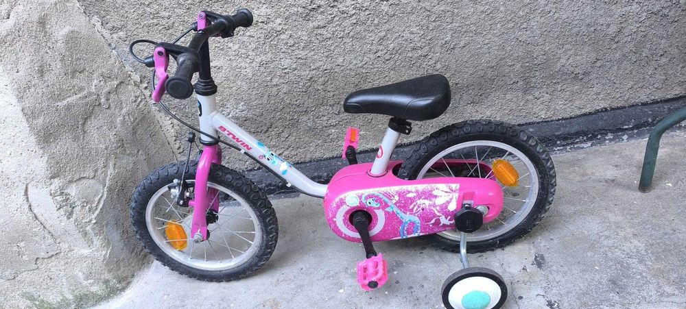 Bicicletă copii B'TWIN 14 inch, cu roți ajutătoare – 300 lei