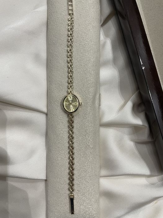 Золотые женские часы