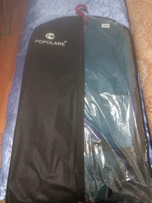 Продам костюмы 1 новый